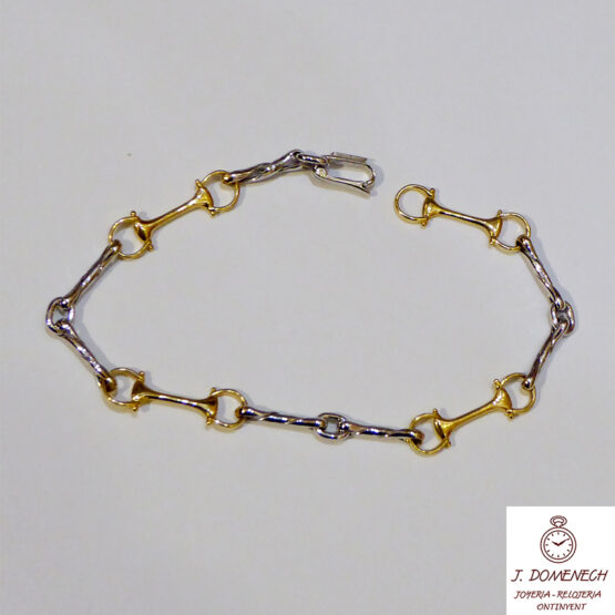 Pulsera de oro bicolor maciza con estribos