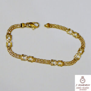 Pulsera de oro amarillo con cadena bismark y 5 detalles